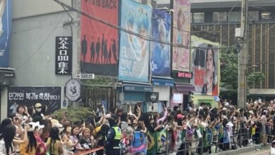 Fans gather near HYBE headquarters for RM and V’s discharge