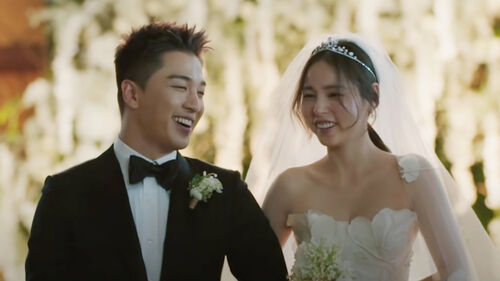 Min and Taeyang at their own wedding.
