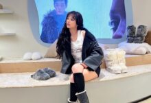 Soyeon in white lace outfit