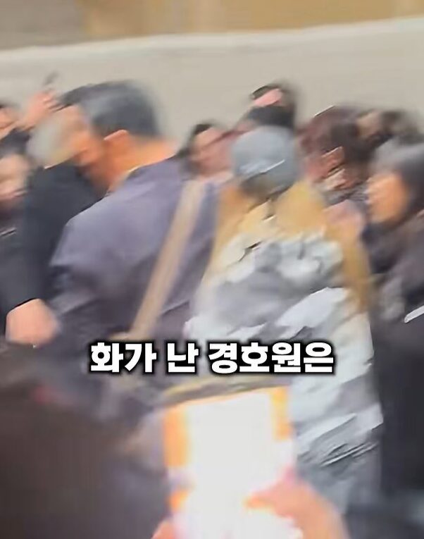 Karina struggling in crowd