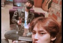 Photo of Cha Eunwoo and Mingyu with caption joking about tax evasion