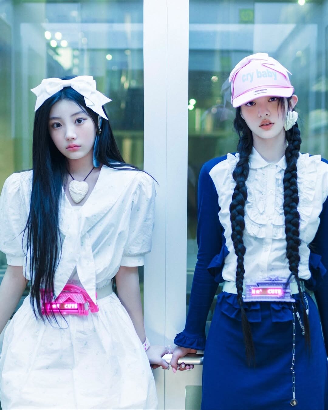 ILLIT's Concept Photos Trigger Fresh Claims of Imitating NewJeans 1 ILLIT’s Wonhee and Minju in “Not Cute Anymore” concept photos | _@every______things/Instagram_