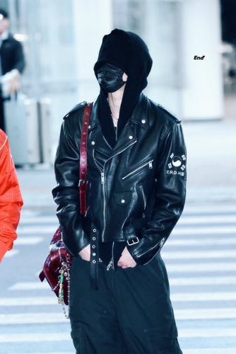 Ni-Ki in leather and hoodie