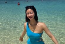 Han Groo showing her bodysuit