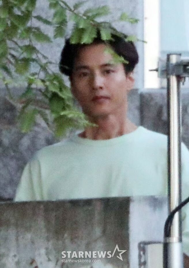 Won Bin with long hair