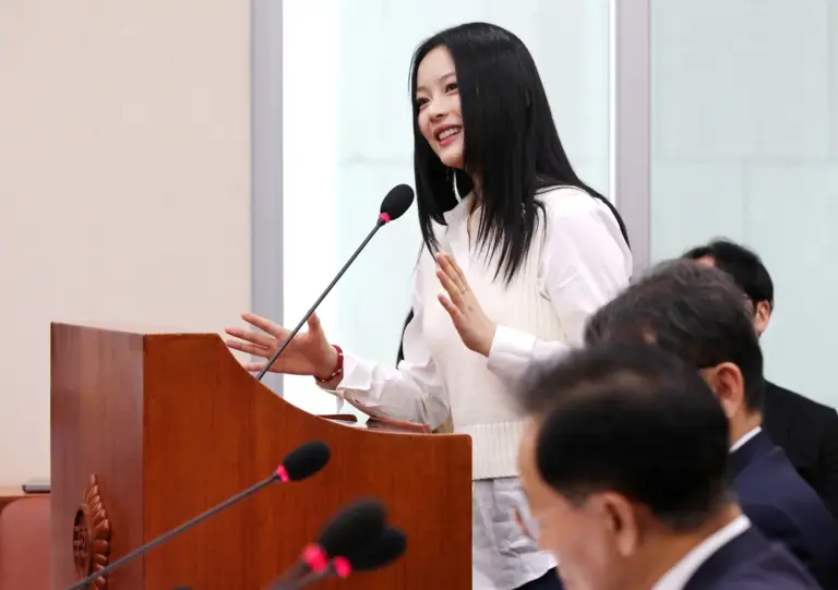 NewJeans member Hanni speaking at the National Assembly hearing
