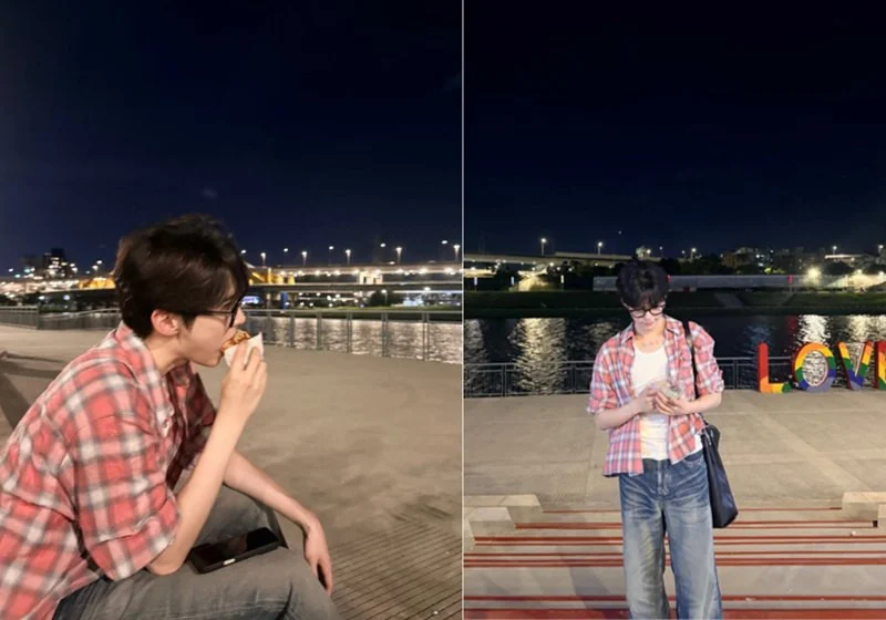 Sung Han Bin enjoying a snack at a waterfront park